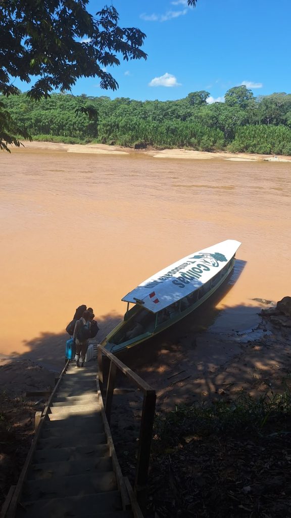 Our boat on the bank of the Tambopata River